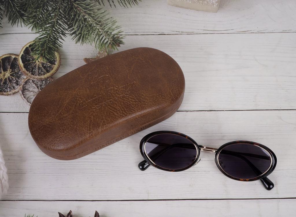 Erminio Palamino Unisex Oval Sunglasses with Tortoiseshell Frame, Silver Metal Arms, and Grey Lenses